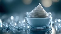 Luxurious white cream in elegant glass jar with sparkling diamonds on reflective surface. Premium skincare moisturizer for anti-aging beauty routine.