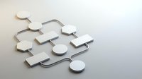 White wooden puzzle pieces scattered on neutral background showing problem solving and strategic thinking concepts for business presentations.