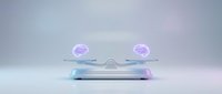 Futuristic holographic display platform with glowing purple orbs and blue base on gradient background for technology presentations and sci-fi concepts.