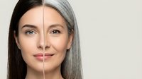 Woman face split showing aging process from young brunette to mature gray hair against neutral background for skincare and beauty concepts.