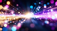 Abstract digital tunnel with bright light burst and colorful bokeh particles creating dynamic motion blur effect for technology backgrounds.