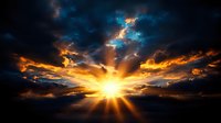 Dramatic sunset sky with vibrant orange sunburst breaking through dark storm clouds, creating powerful light rays and atmospheric mood for backgrounds and nature themes.