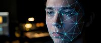 Young Caucasian businessman with facial recognition technology overlay showing connected dots and lines for biometric security and AI identification.