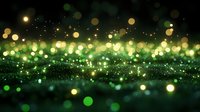 Magical green and gold bokeh lights creating dreamy abstract background with glowing particles and sparkles floating in dark space. Festive holiday atmosphere.