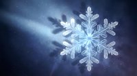 Crystal clear snowflake with intricate geometric patterns against dreamy blue winter background with soft light rays and bokeh effects for holiday designs.