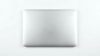 Closed silver laptop top view isolated on white background, sleek modern design for technology, business, and digital workspace concepts.