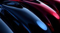 Abstract flowing liquid metal waves in blue and red colors creating dynamic motion blur effect with glossy reflective surfaces and smooth gradients.