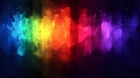 Vibrant rainbow spectrum with colorful smoke effect and glowing particles on dark background, creating dynamic abstract light waves for creative designs.