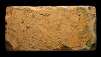 Weathered tan brick with rough, aged texture and natural surface variations isolated on transparent background, ready for design use in architectural graphics, print-on-demand products, and digital composites.