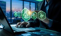 Businessman using laptop with green energy icons in modern office overlooking city skyline at sunset for sustainable technology solutions.