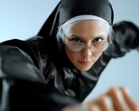 Young woman in religious attire and glasses looking intently at camera with serious expression against light blue background, dramatic lighting creates moody atmosphere.