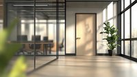 Modern minimalist office interior with glass walls, potted plant and natural lighting creating professional atmosphere for business environment.