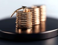 Stacks of silver coins on dark reflective surface with upward arrow symbol representing financial growth and investment success in warm lighting.