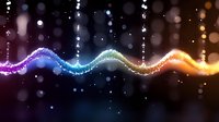 Colorful energy wave with glowing particles and bokeh lights on dark background. Digital sound visualization with rainbow spectrum colors flowing smoothly.