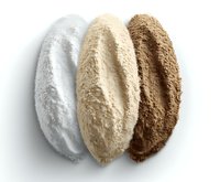 Three piles of different colored flour or powder - white, beige and brown - arranged in oval shapes on white background, isolated for easy design use.