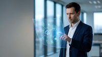 Caucasian businessman in suit interacting with futuristic holographic interface displaying cloud computing and technology icons in modern office.