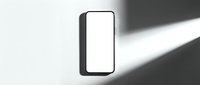 Modern smartphone with blank white screen mockup on neutral background with dramatic shadow overlay for app presentation and digital marketing materials.
