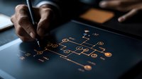 African American male hand drawing digital flowchart on tablet screen with stylus pen, orange glowing network diagram nodes on dark background showing business process.