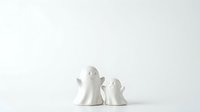 Isolated white ceramic ghost figurines on white background, ready for design projects, clipart, and decorative applications.