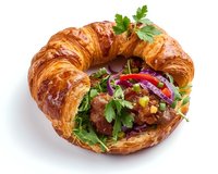 Fresh butter croissant sandwich filled with meat patty, mixed greens, red onions, corn and parsley garnish on white background, isolated food photography.