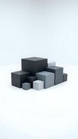 Abstract geometric composition with black, gray and white cubes arranged in modern minimalist style on neutral background for contemporary design projects.