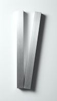 Two brushed metal strips arranged in V shape on white background creating modern minimalist composition for industrial design projects.