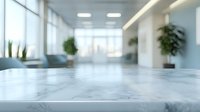 Modern marble countertop in bright contemporary office lobby with glass doors and indoor plants, showcasing elegant interior design.