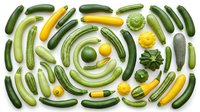 Fresh green and yellow zucchini, cucumbers and summer squash vegetables arranged in organized pattern on white background, isolated for healthy cooking designs.