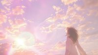 Young African American woman with curly hair in pink dress standing against dramatic sunset sky with glowing clouds and sunbeams creating ethereal atmosphere.