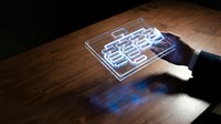 Futuristic holographic calculator interface projected on wooden desk with hand interaction for digital technology and virtual reality applications.