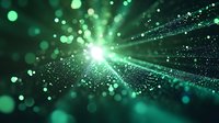 Bright emerald green light rays burst through dark space with glowing bokeh particles and sparkling dust creating magical atmospheric effect. Suitable for abstract backgrounds.