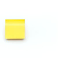 Yellow sticky note isolated on white background for office reminders and organizational tasks.