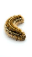 Curved brown and tan fur texture forming letter S shape on white background, suitable for typography, design elements, and creative projects.