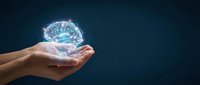 Human hands holding glowing digital brain hologram representing artificial intelligence, machine learning and neuroscience innovation concepts.