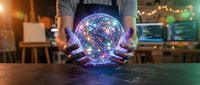Hands holding glowing digital globe with network connections in modern office workspace, representing global technology, data connectivity, and business innovation.