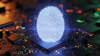 Digital fingerprint hologram on computer circuit board with glowing lights representing cybersecurity biometric authentication technology for secure access.