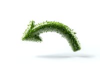 Green curved arrow made of small particles and leaves floating in air on white background, isolated design element for eco-friendly concepts.