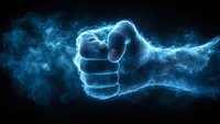 Glowing blue fist made of energy and smoke effect on black background, powerful force symbol representing strength and determination in dramatic lighting.