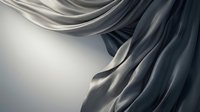 Flowing silk fabric with elegant drapes and folds in monochromatic tones, creating abstract waves and curves against neutral background for design projects.