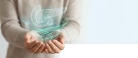 Woman hands holding holographic digital brain with neural networks glowing in turquoise light representing artificial intelligence and neuroscience concepts.