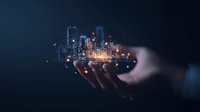 Glowing digital city skyline floating above outstretched hand against dark background, representing smart city technology and urban innovation concept.