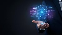 Businessman in dark suit holding glowing digital network interface with connected nodes and data visualization, representing technology, connectivity, and innovation for business solutions.