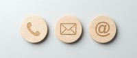 Three wooden circular buttons with contact icons including phone, envelope, and email symbol, isolated on white background for web design, app development, and digital communication projects.