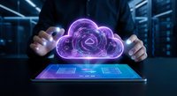 Businessman hands protecting holographic cloud computing icon above digital tablet in modern data center for secure technology solutions.