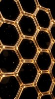 Golden hexagonal honeycomb structure with glowing translucent cells against black background. Suitable for science, technology, molecular research, and abstract design projects.