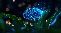 Glowing blue brain silhouette among green leaves with bokeh lights and sparkles, representing artificial intelligence, mind power and natural intelligence concept.