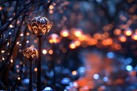 Decorative metal garden stakes with intricate floral patterns illuminated by warm bokeh lights creating magical evening atmosphere for outdoor decor.