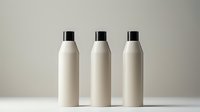 Three minimalist white plastic bottles arranged in row on light background, modern cosmetic packaging mockup for branding and product design.