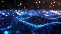 Glowing blue particle wave with bokeh lights against dark background creates futuristic digital landscape effect for technology and science designs.