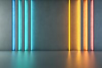Glowing neon tubes in blue, yellow and pink colors against gray wall creating vibrant reflections on floor, modern minimalist lighting background.